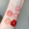 Color swatches of lipsticks on a person's arm with labeled colors.