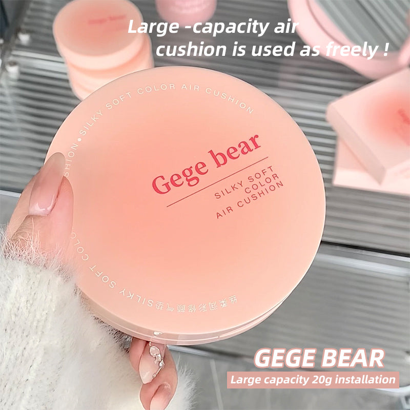 Gege bear air cushion compact held by a hand with blurred background