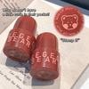 Two red lip jelly products with 'GEGE BEAR' branding on a surface.