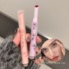 Two lip products with a close-up of a person wearing makeup labeled '06# Amber Black Tea'.