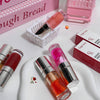 Lip glosses on a white surface with 'Gegg bread' packaging in the background