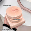 Compact cosmetic product with 'Gege bear' branding held by a hand, showing dimensions and weight.