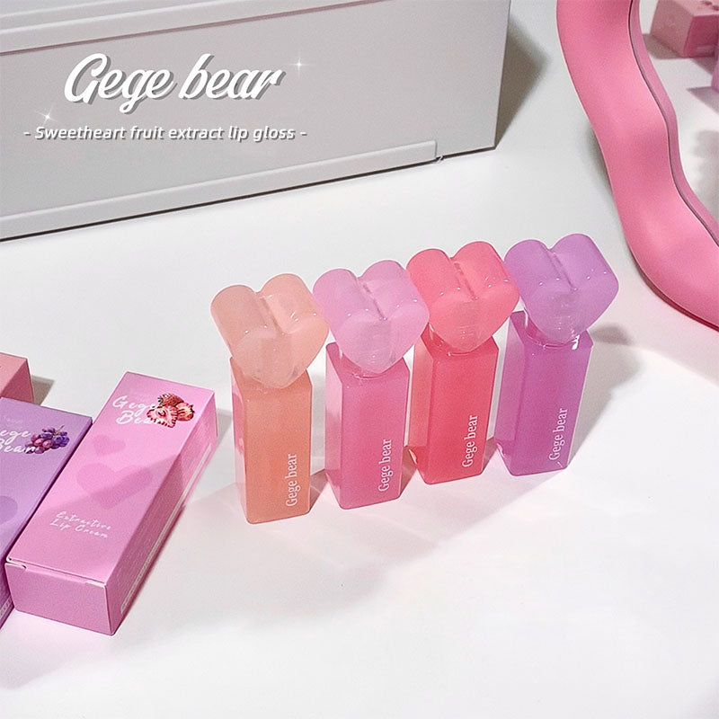 Set of Gege Bear lip glosses in various shades on a white background