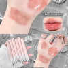 Lipstick being applied to a hand with close-up shots of lips and lipstick on a neutral background.