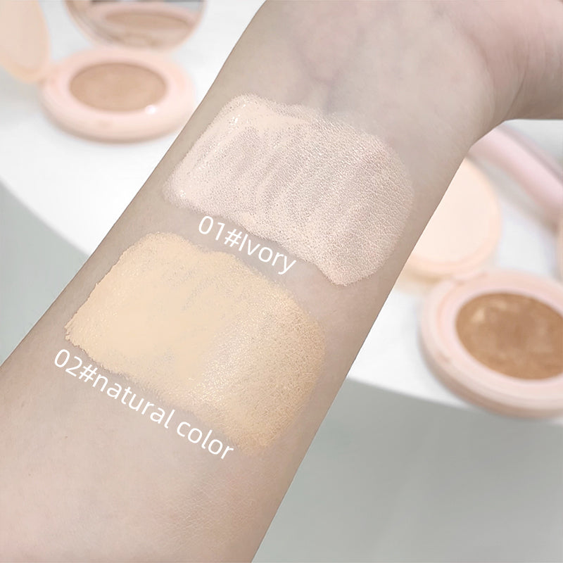 Cosmetic swatches on a arm with '01#Ivory' and '02#Natural Color' labels.