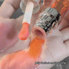 Close-up of a hand holding a lip balm with jelly-like texture, labeled 'Jelly feels so moisturizing!'.