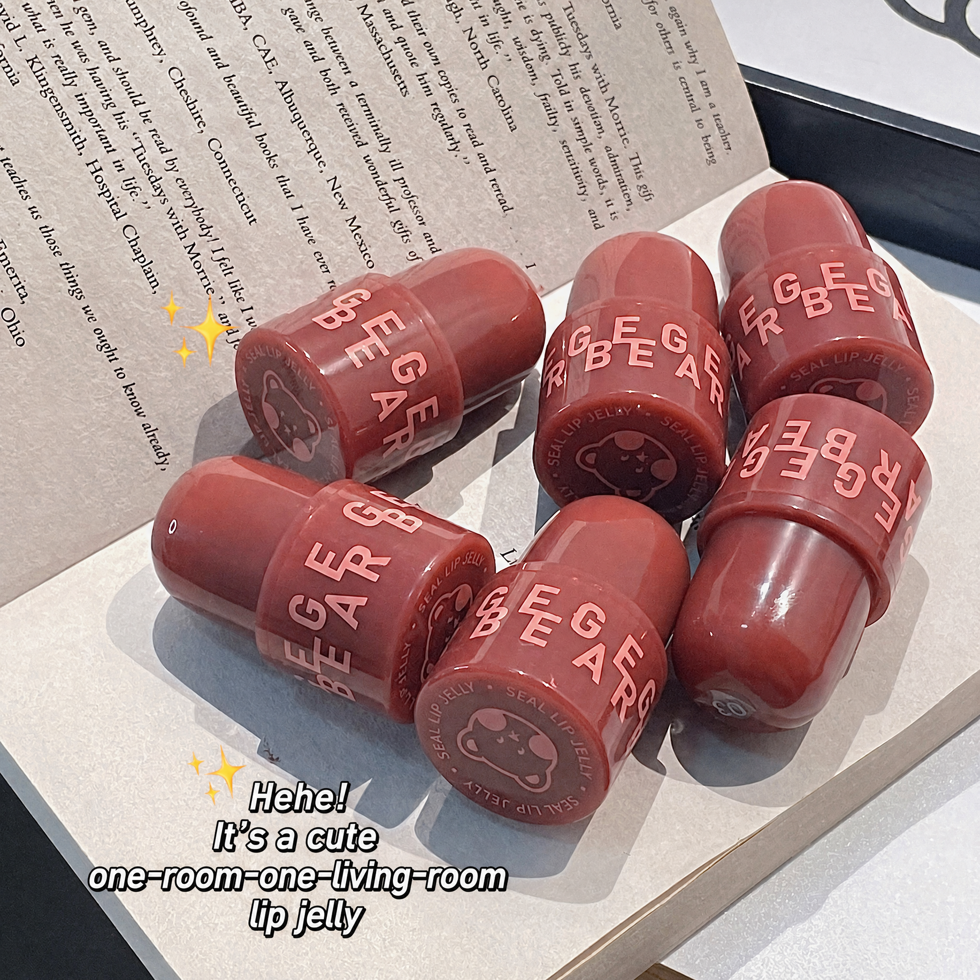 Red lip jelly with 'BEGE' branding on a surface with text underneath