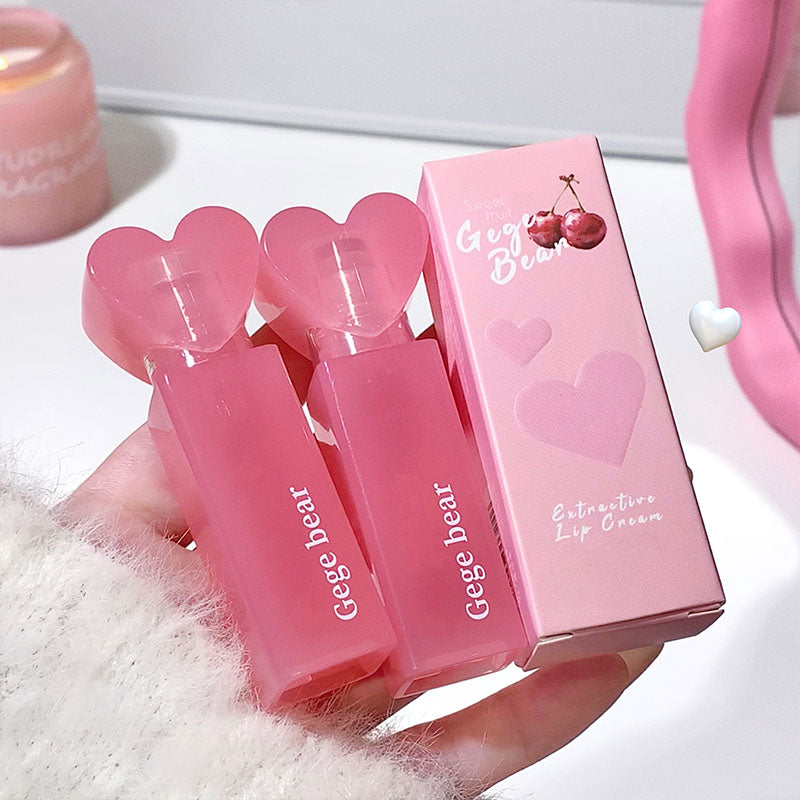 Pink lip cream with heart-shaped design and 'Gege bear' branding on a white background.