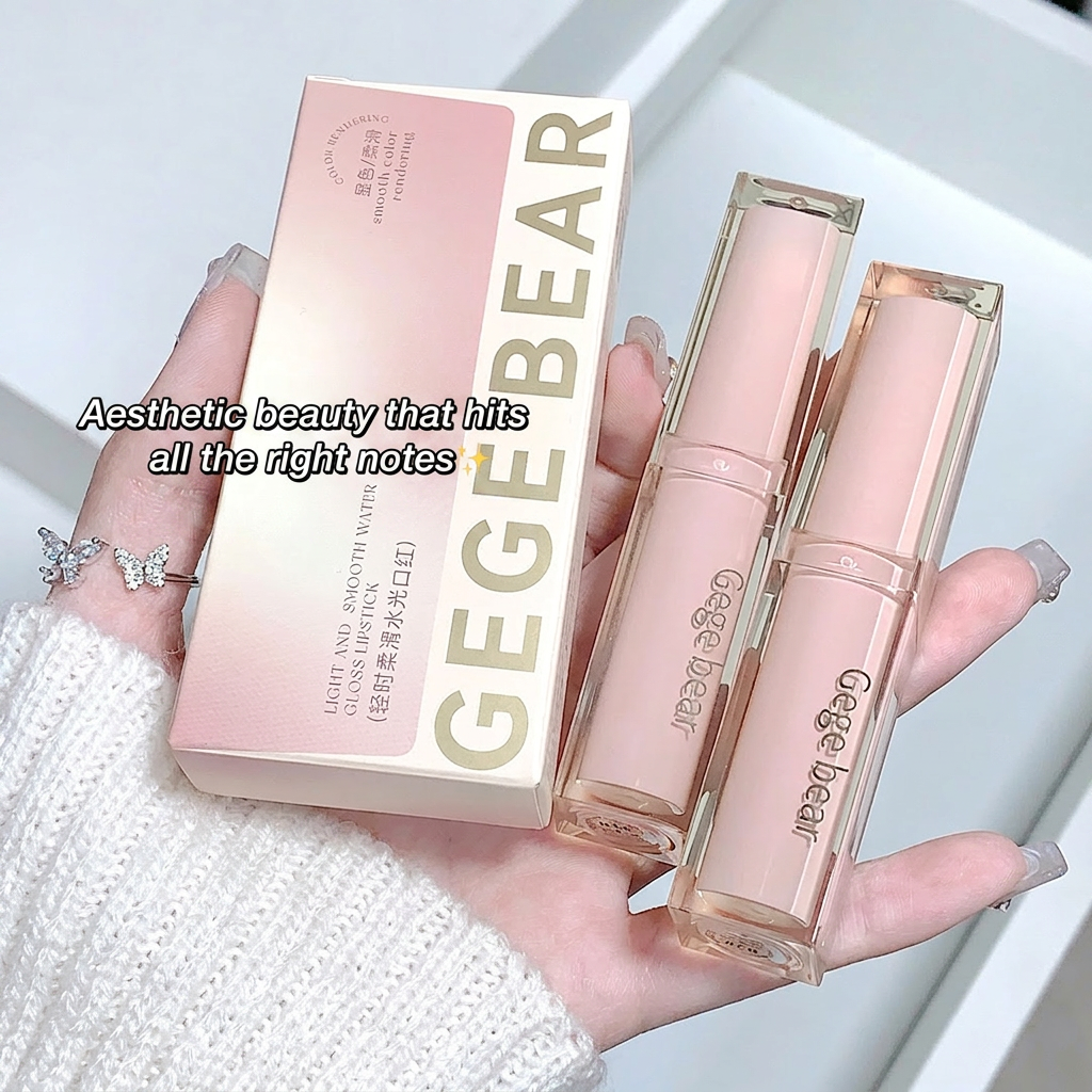 Two lip glosses and their packaging held by a hand, with 'GEGE BEAR' branding.