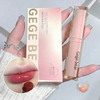 Lip gloss with packaging and close-up of lips wearing the product