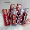 Lip gloss bottles with 'Gege Bear' branding on a white surface.