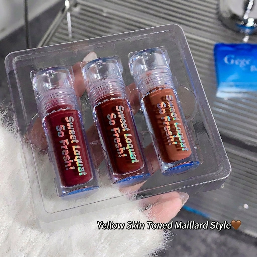 Three lip glosses in clear packaging with 'Sweet Loquat' and 'So Fresh!' branding.