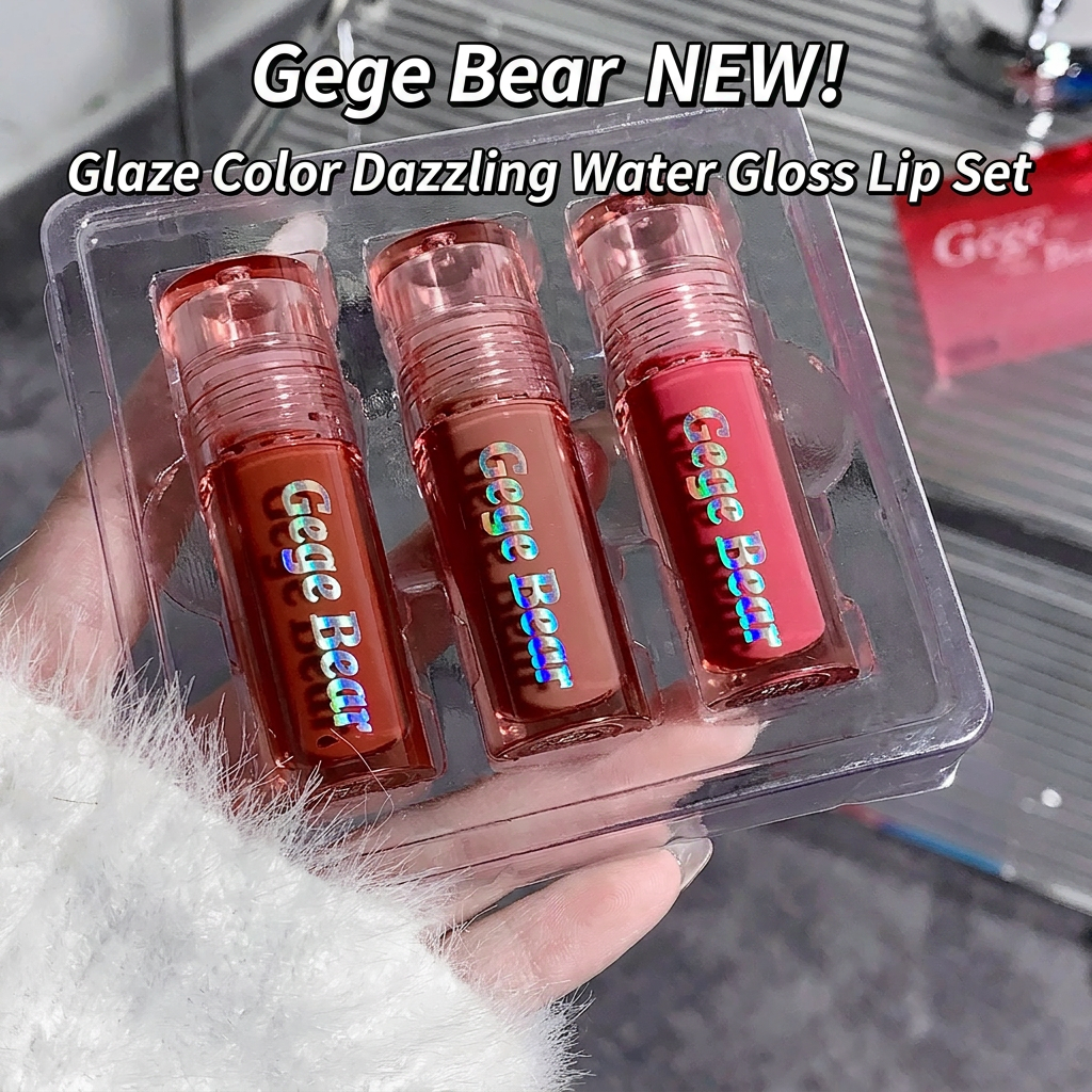 Three Gege Bear lip glosses in a clear packaging held by a hand.