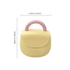 Small yellow handbag with pink handle and dimensions on a white background